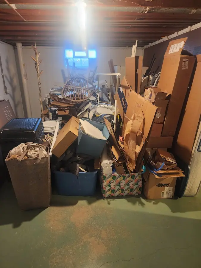 Roll-off dumpster container at job site for 2 Yard Dumpster Rental in Kildeer